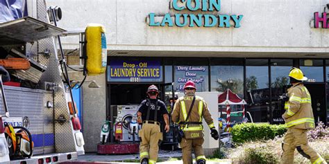 Crews responding to laundromat fire